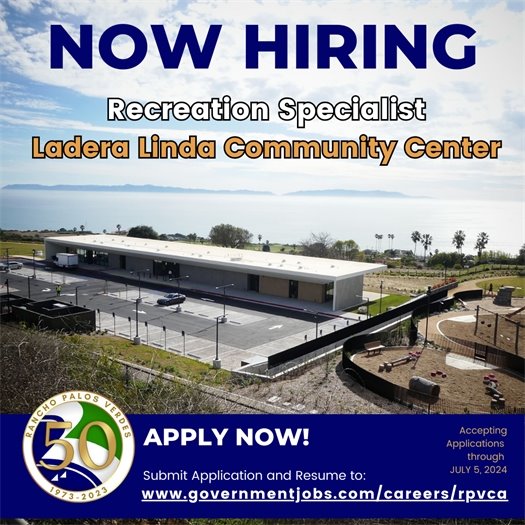 Catalina Island is seen in the distance behind the Ladera Linda Community Center in Rancho Palos Verdes. A headline above the City of Rancho Palos Verdes logo says Now Hiring. Subheads say Recreation Specialist, Ladera Linda Community Center. Apply now! Submit Application and Resume to: www.governmentjobs.com/careers/rpvca. Accepting applications through July 5, 2024.