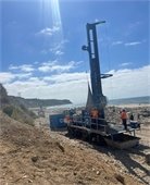 Dewatering well drilling on the beach.