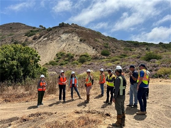 City staff, the consultant team working on the Portuguese Bend Landslide Remediation Emergency Hydraugers Project, and representatives from the California Department of Fish and Wildlife and the U.S. Fish & Wildlife Service take a tour of the project site on July 16, 2024.