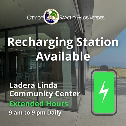 A set of doors lead to Classroom 1 at the Ladera Linda Community Center. A headline below the City of Rancho Palos Verdes logo says Recharging Station Available. A subhead says Ladera Linda Community Center, Extended hours: 9 am to 9 pm daily.