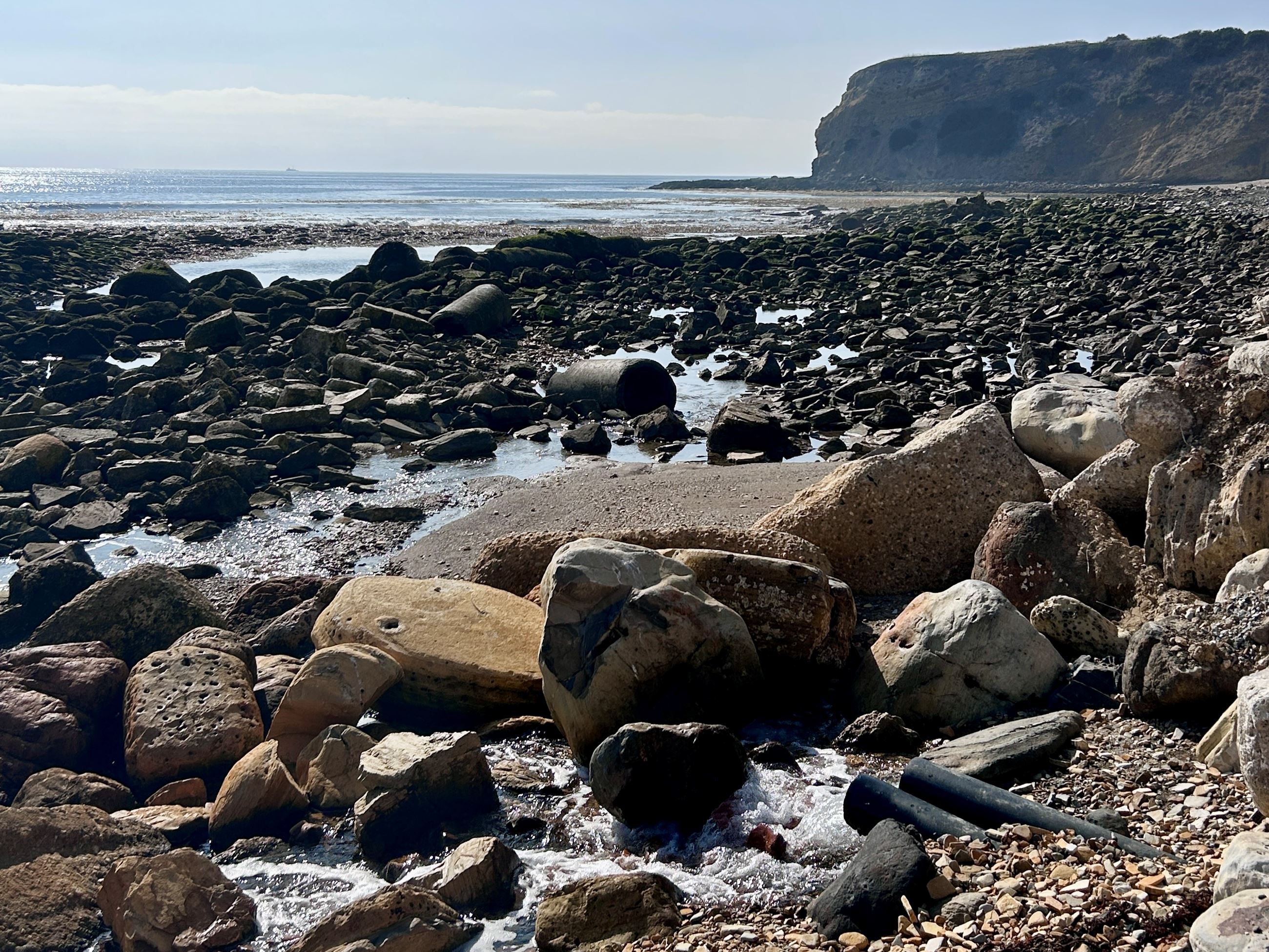 A deep dewatering well on the beach removes groundwater at the toe of the Portuguese Bend Landslide.
